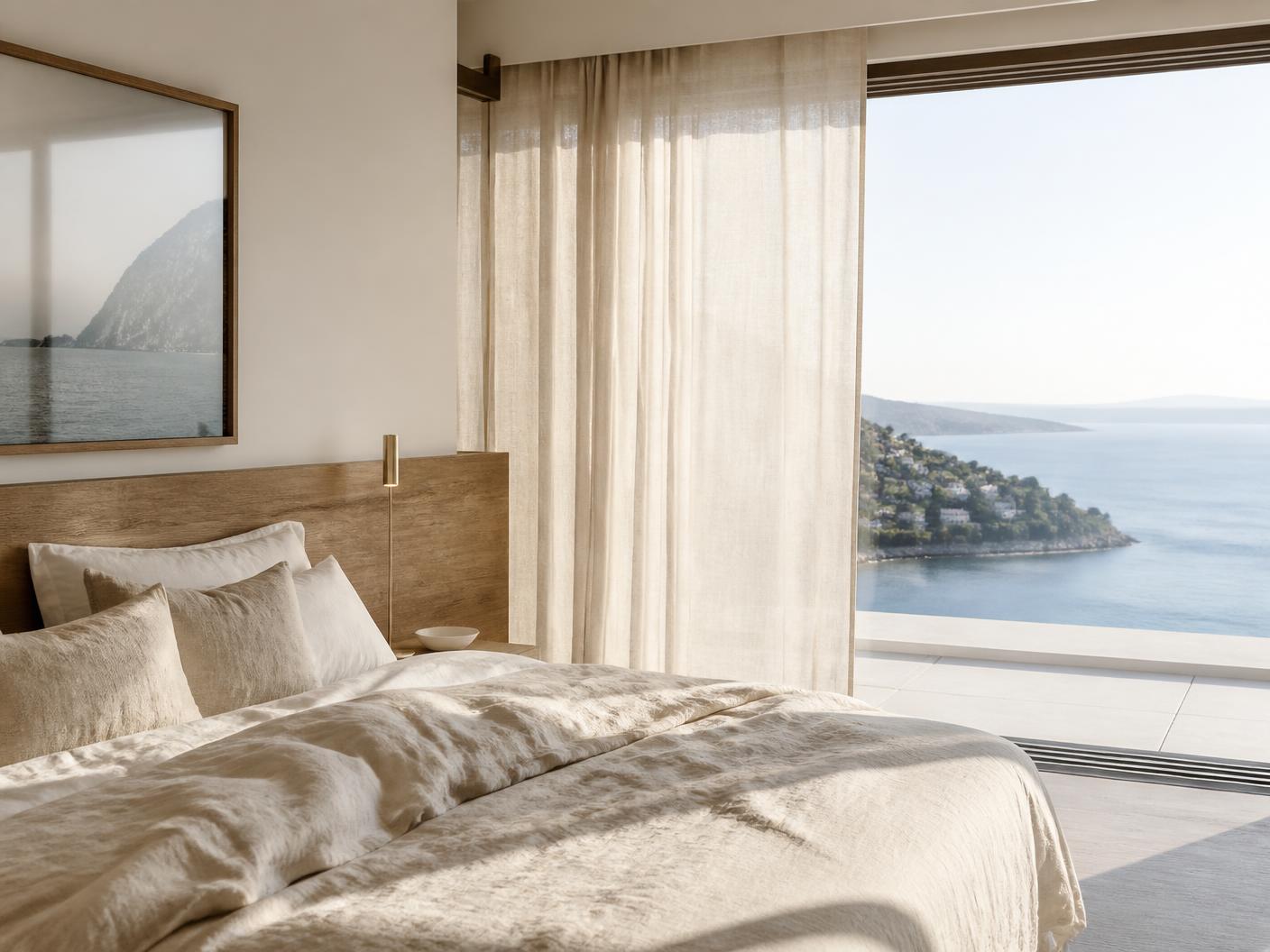 Bedroom in linen and oak with a view over the Adriatic Sea